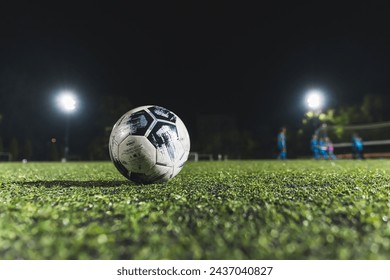 closeup shot of a soccer ball in the stadium at night, football concept. High quality photo - Powered by Shutterstock