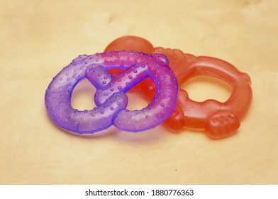 A Closeup Shot Of Soft Chew Baby Toys On Different Shapes