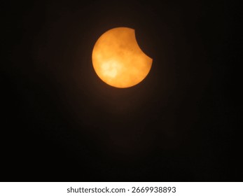 A close-up shot of solar eclipse on black background seen from the Shady Grove Baptist Church, Belton, SC