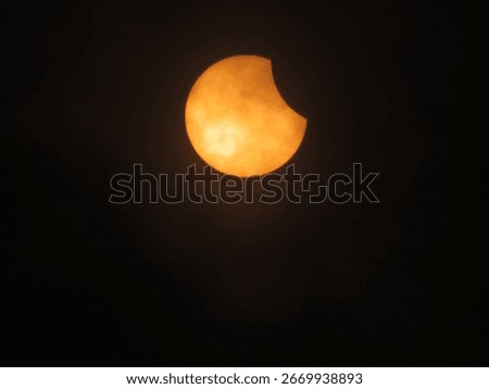 A close-up shot of solar eclipse on black background seen from the Shady Grove Baptist Church, Belton, SC
