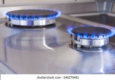 Closeup Shot Of Two Gas Burners In Line Located On Kitchen Stove. Horizontal Image Composition