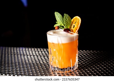 A Closeup Shot Of A Whiskey Sour Cocktail At A Bar Counter