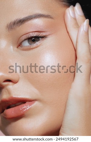 Similar – Image, Stock Photo Close up shot of dark skinned female has satisfied expression, bushy curly hair, wears spectacles and white jumper, looks straightly at camera, models over grey background. Natural beauty concept