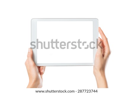 Closeup shot of woman hands holding digital tablet isolated on white background. Female hands holding a palmtop with white screen. Digital tablet with white display ready for your webpage or design.