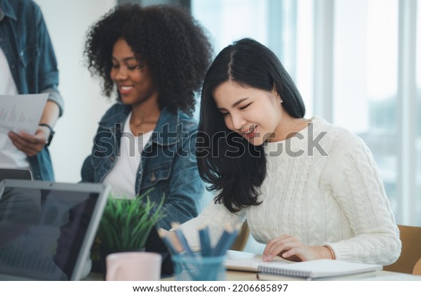 Close-up
shot of a woman meeting in a startup company meeting room, she is a
marketing worker attending meetings with executives and employees
to plan a sales boost. Sales management
concept.