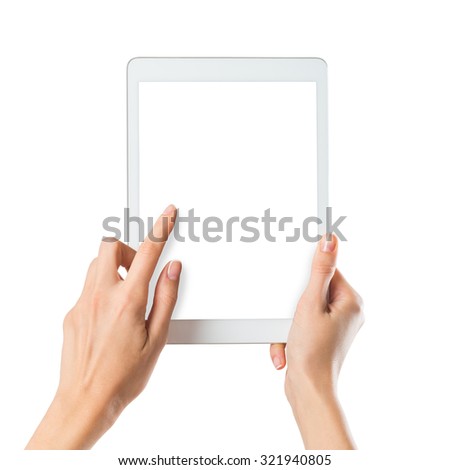 Closeup shot of a woman typing a text on digital tablet isolated on white screen. Girl holding a palmtop with white display. Female hands holding a modern digitaltablet with with screen.
