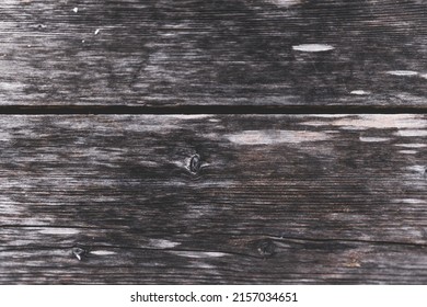A closeup shot of a wooden table with grey and white texture and the juncture line - Shutterstock ID 2157034651