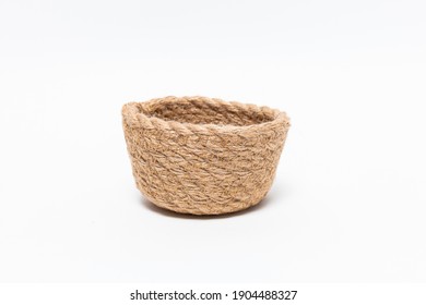 A Closeup Shot Of A Woven Basket Isolated On A White Background