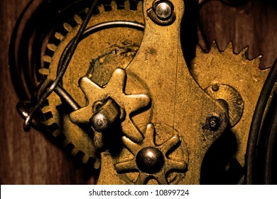 Close-up Showing The Gears Inside An Old Grandfather Clock