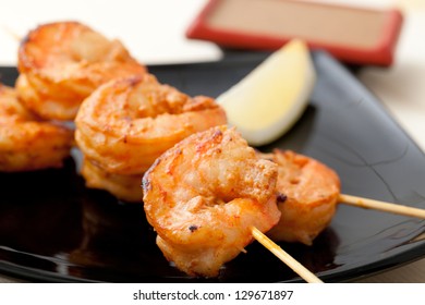 Closeup Of Shrimp Kebab And Souse