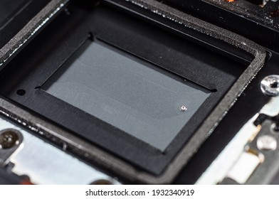 Close-up shutter covering the camera sensor, macro photography