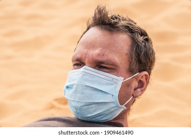 Close-up Side Portrait Man Wear Protect Mask, Face Expression Emotion, Furrowed Brow Wrinkle Look. COVID Stress Syndrome, Mental Health, Fear Of Danger Contamination, Adverse Social Consequence