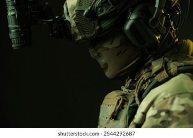 A close-up side profile of a soldier wearing tactical gear and night vision goggles, highlighting the camouflage pattern and military technology.  - Powered by Shutterstock