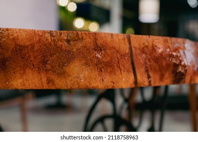 Closeup Side View Of Epoxy Resin Round Wood Table. Reclaimed Wood Furniture And Live Edge Table Made From Fallen Trees