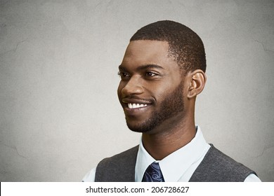 Closeup Side View Portrait, Headshot, Handsome Happy, Young Business Man, Confident Student, Real Estate Agent, Isolated Black Grey Background. Positive Face Expressions, Emotions, Feelings, Attitude