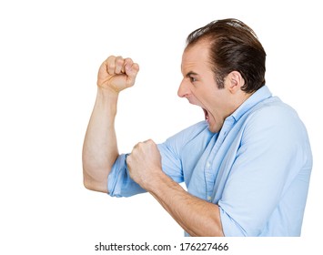 Closeup Side View Profile Portrait Of Angry Upset Young Business Man, Funny Worker Employee, Fists In Air, Open Mouth Yelling Isolated On White Background. Negative Emotion Facial Expression Emotion