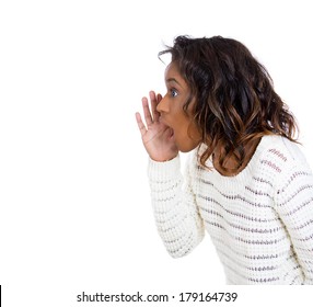 Closeup Side View Profile Portrait Of Mad, Angry, Upset, Hostile Young Woman, Furious Yelling, Screaming Hand To Mouth, Isolated On White Background. Negative Emotions, Facial Expressions Reaction