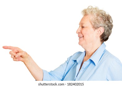 Closeup Side View Profile Portrait Of Senior Mature Woman Laughing Pointing Finger At Someone Or Something, Isolated White Background. Positive Emotion Facial Expression Feelings, Attitude, Reaction