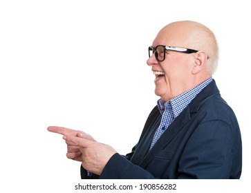 Closeup Side View Profile Portrait Senior Man In Glasses, Laughing, Pointing With Finger At Someone, Isolated White Background. Positive Human Face Expressions, Emotions, Feelings, Attitude, Approach