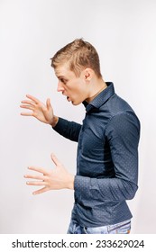 Closeup Side View Profile Portrait Of Angry Man, With Hands In Air To Strangle Someone