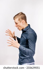 Closeup Side View Profile Portrait Of Angry Man, With Hands In Air To Strangle Someone