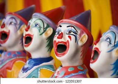 Closeup of sideshow clowns