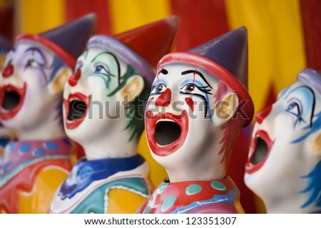 Closeup of sideshow clowns