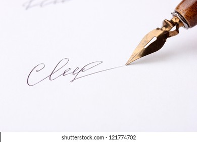 Closeup Of Signature (fake, Not Real) And Ink Pen, Isolated On White