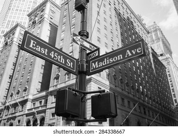 A Closeup To Signs For East 45th And Madison Avenue In New York City