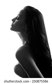 closeup silhouette of attractive caucasian woman wearing bra