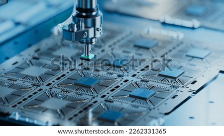 Close-up of Silicon Die are being Extracted from Semiconductor Wafer and Attached to Substrate by Pick and Place Machine. Computer Chip Manufacturing at Fab. Semiconductor Packaging Process. Stockfoto © 