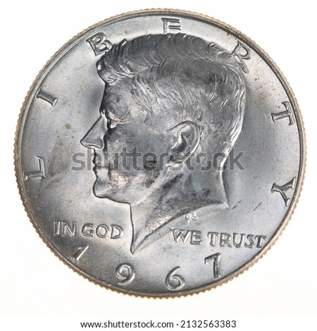 Close-up of a silver 1967 Kennedy Half Dollar