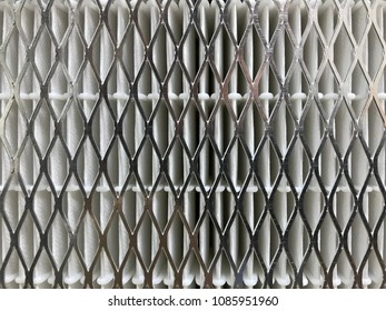 Closeup Of Silver Metal Mesh On White Paper Of Fume Extractor Filter For Background Or Backdrop