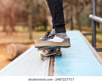 Close-up of Skateboarder Feet on Skateboard Ramp - Powered by Shutterstock