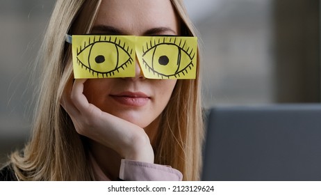 Close-up sleeping girl funny lazy caucasian business woman tired sleepy female worker with sticky notes on eyes glasses with stickers sleeps in office feeling fatigued napping at workplace portrait