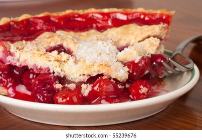 Closeup Of A Slice Of Cherry Pie On A Plate