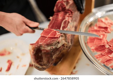 Close-up of Slicing Jamón Serrano