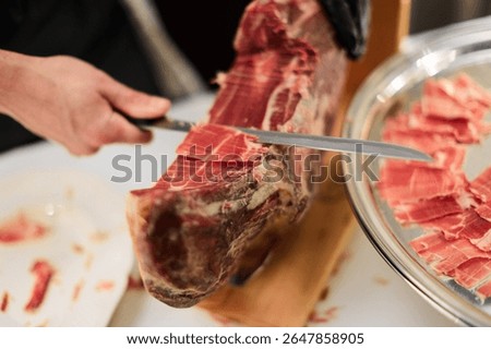 Close-up of Slicing Jamón Serrano