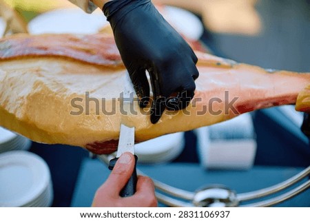 Close-up of Slicing Jamón Serrano