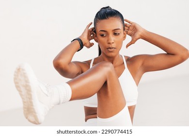 Close-up of slim female doing bicycle crunches. Fitness woman practicing abs exercises. - Powered by Shutterstock