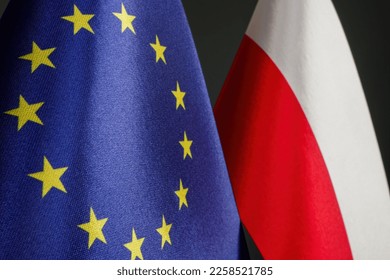 Close-up of small EU and Poland flags. - Shutterstock ID 2258521785