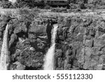 Closeup of a small fall between rocks of the Iguazu Falls, Argentina in black and white