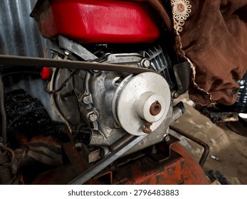 a close-up of a small, internal combustion engine, commonly used for industrial or agricultural machinery