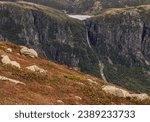 Closeup of small pool and waterfall from the mountain across from Gros Morne summit