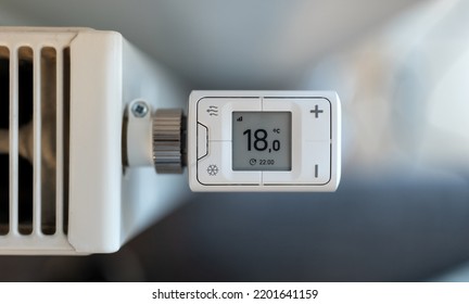 Close-up of smart heating thermostat - Shutterstock ID 2201641159