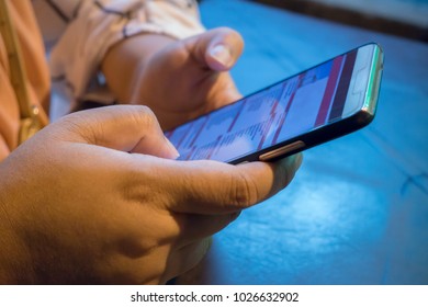 closeup of smartphone user