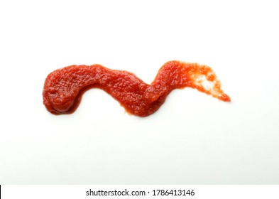 Closeup Of Smear Of Tomato Sauce On The White Background