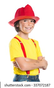 Closeup Of Smiling Boy Wearing Firefighter Helmet Isolated On White Background. Happy Little Fireman Looking At Camera With Armcrossed.
