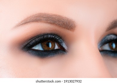 Closeup Smoky Makeup Eye Dark Eyelids. Female Eyes With Beautiful Bright Fashion Style