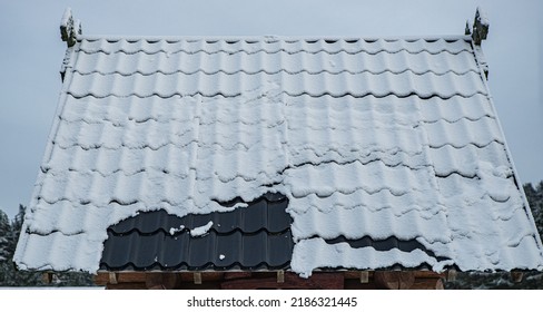 Close-up Of Snow On A Tiled Roof.